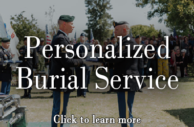 Servicemen folding the flag at a gravesite